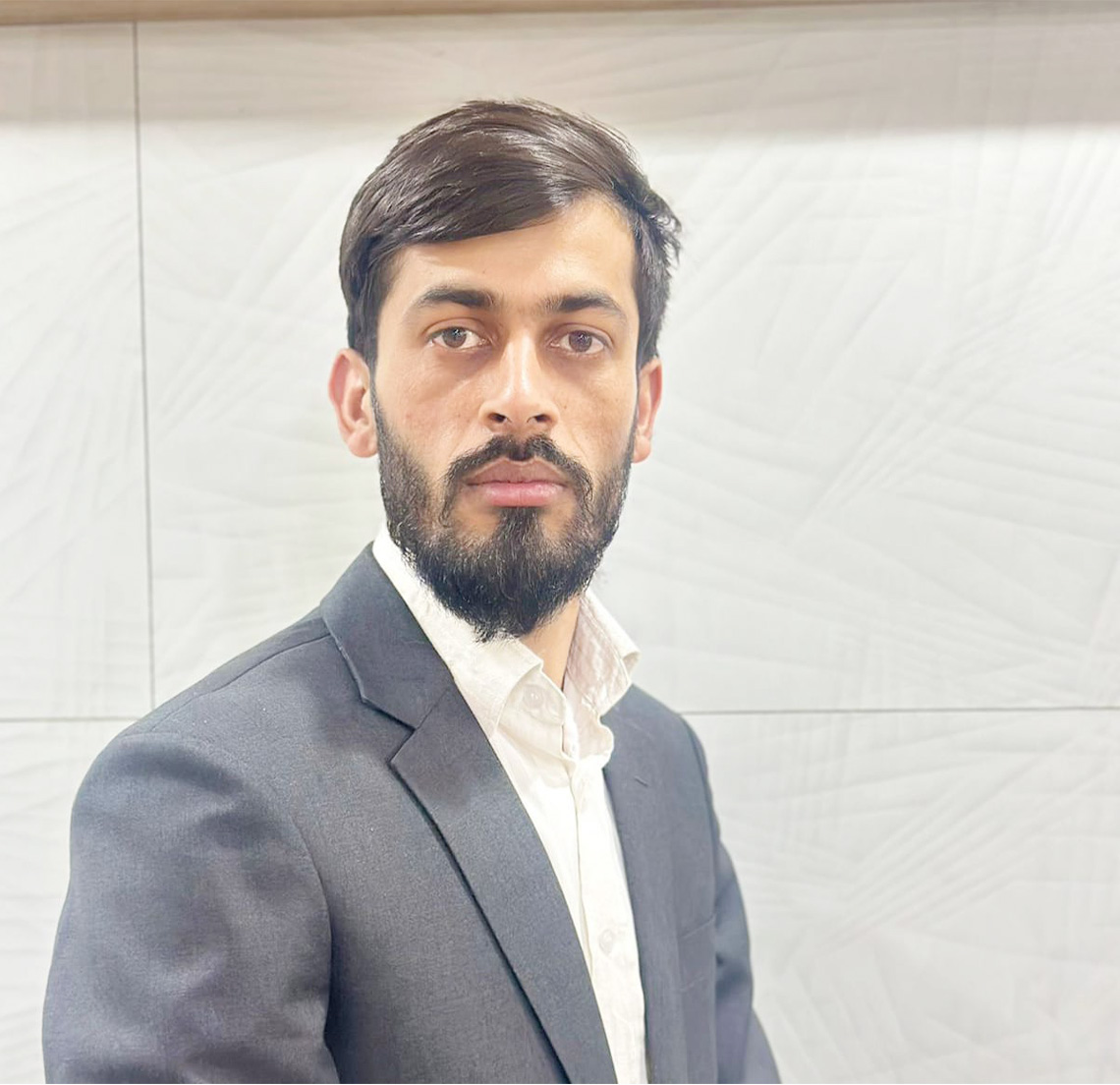 Management team, photo of Laxmi Prasad Acharya